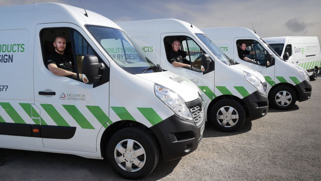 A group of four Quingo courier vans