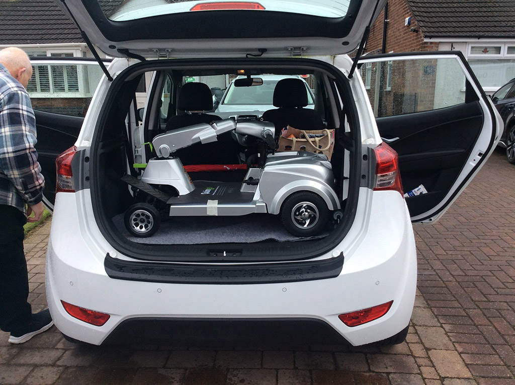 The Ultra compact mobility scooter in a car boot