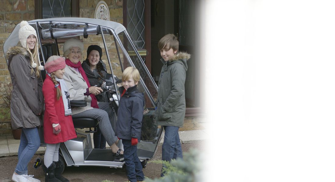A family with a scooter